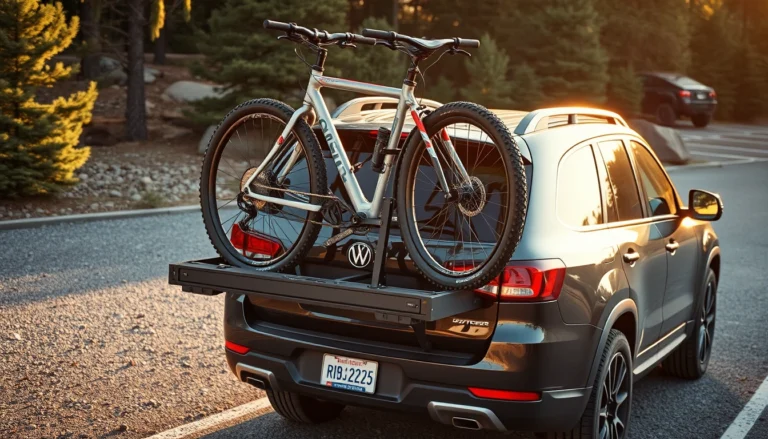 Mountain bikes loaded on a hitch-mounted platform bike rack on the back of a dark SUV at a trailhead